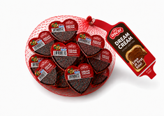 Net Bag with Hazelnut Praline “Dream Cream” in Heart-Shaped Packs 168g